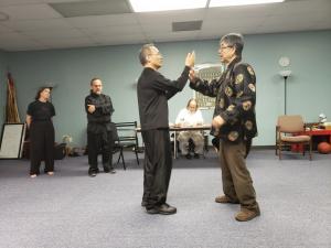 Grand Master Lee demonstrating techniques during test